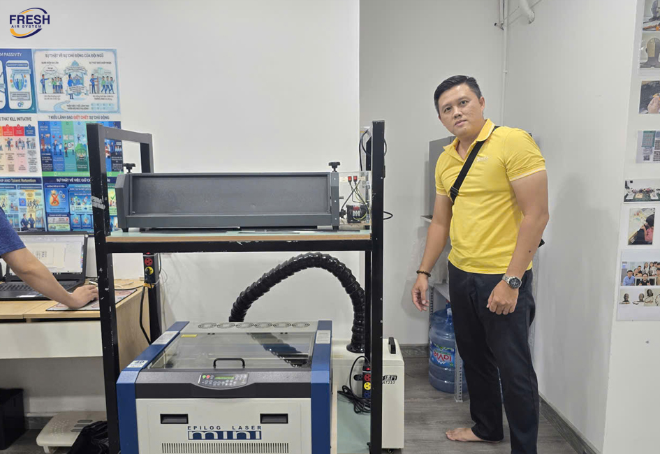 hut-khoi-may-cat-vai-bang-laser